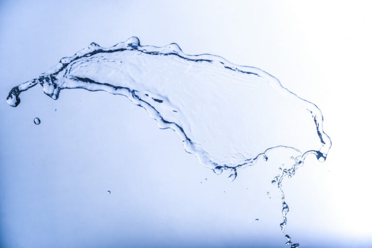 Water splash symbolizing recycled water systems that improve water security, climate resilience, and sustainable water management through wastewater reuse.